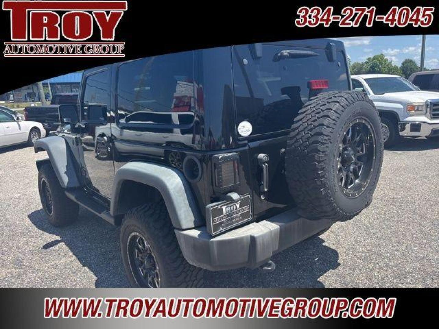2017 Black Clearcoat /Black Jeep Wrangler Sport (1C4AJWAG0HL) with an 3.6L V6 24V VVT engine, Automatic transmission, located at 6812 Atlanta Hwy, Montgomery, AL, 36117, (334) 271-4045, 32.382118, -86.178673 - Painted to match hardtop!!<br>Power Windows/Locks!!<br>Full Matching Spare!!<br>2-Master Keys!!<br>Alpine factory premium stereo!!<br>Prp premium seat covers!!<br>2 Fox Lift Kit!!<br> - Photo#13