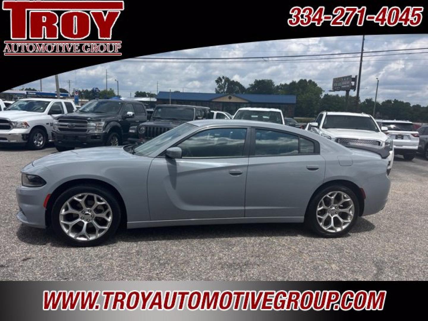 2022 Smoke /Black Dodge Charger SXT (2C3CDXBG8NH) with an 3.6L V6 SMPI DOHC 24V LEV II 292hp engine, Automatic transmission, located at 6812 Atlanta Hwy, Montgomery, AL, 36117, (334) 271-4045, 32.382118, -86.178673 - Smoke Show 2022 Dodge Charger SXT RWD 3.6L V6 SMPI DOHC 24V LEV II 292hp 8-Speed Automatic<br><br>Financing Available---Top Value for Trades.<br><br>19/30 City/Highway MPG- Photo#1