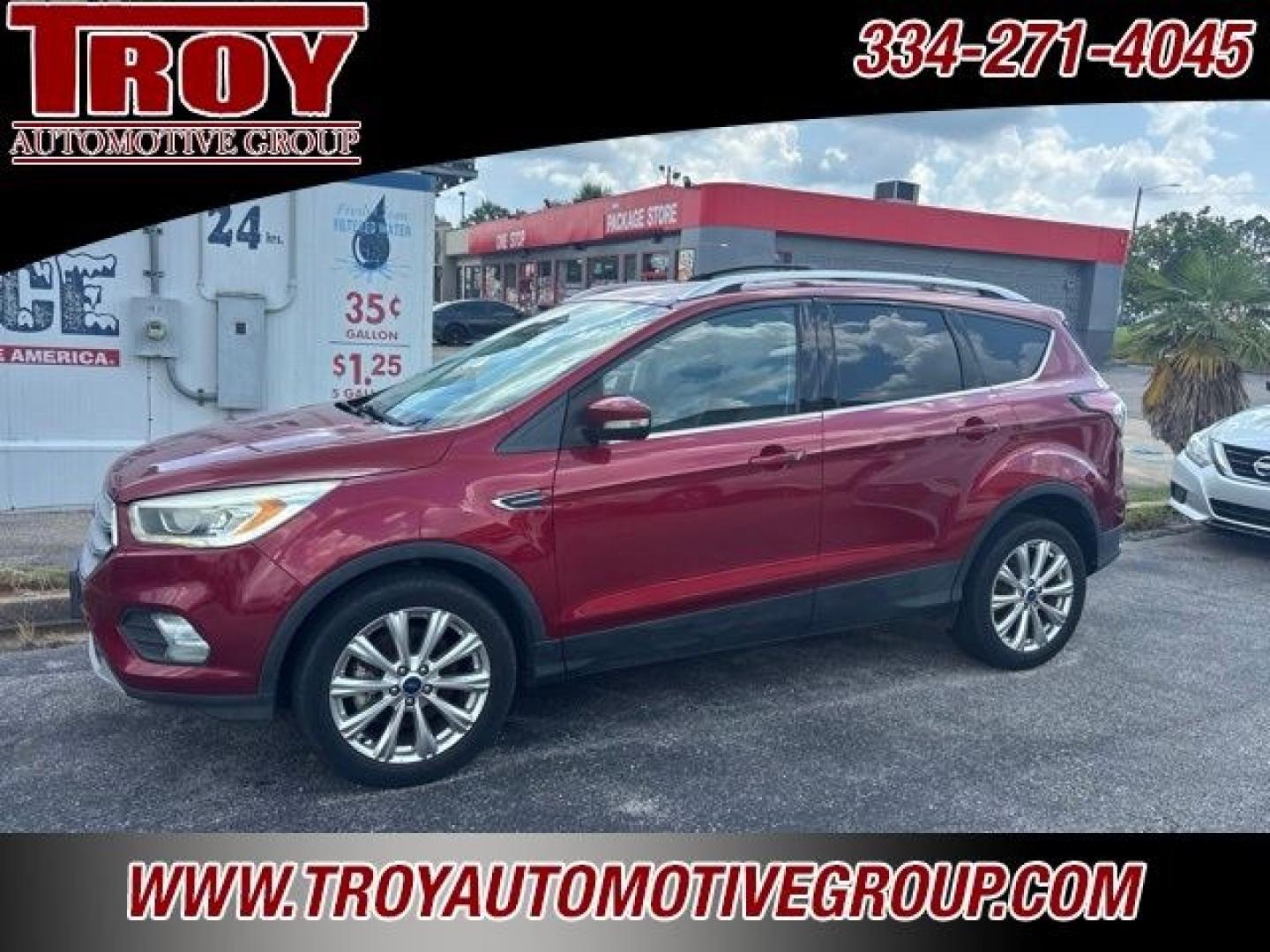 2017 Ruby Red Metallic /Black Ford Escape Titanium (1FMCU9J93HU) with an EcoBoost 2.0L I4 GTDi DOHC Turbocharged VCT engine, Automatic transmission, located at 6812 Atlanta Hwy, Montgomery, AL, 36117, (334) 271-4045, 32.382118, -86.178673 - Priced below KBB Fair Purchase Price!<br><br>Ruby Red Metallic 2017 Ford Escape Titanium 4WD EcoBoost 2.0L I4 GTDi DOHC Turbocharged VCT 6-Speed Automatic<br><br>Financing Available---Top Value for Trades.<br><br>Odometer is 18847 miles below market average! 20/27 City/Highway MPG<br><br><br>Awards:- Photo#2