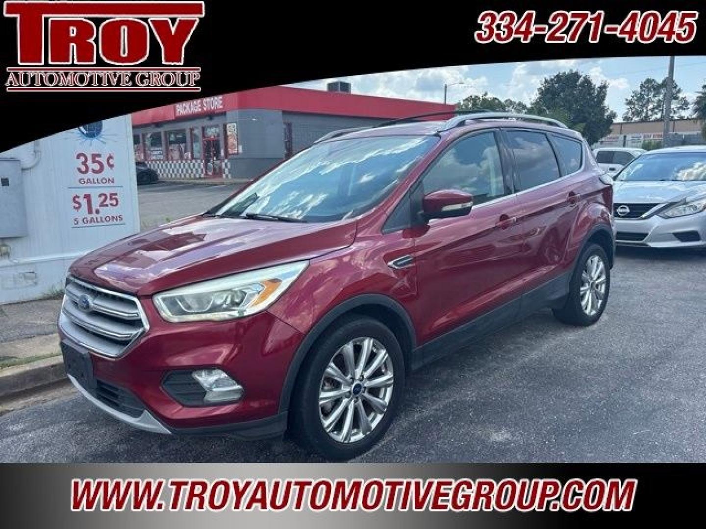 2017 Ruby Red Metallic /Black Ford Escape Titanium (1FMCU9J93HU) with an EcoBoost 2.0L I4 GTDi DOHC Turbocharged VCT engine, Automatic transmission, located at 6812 Atlanta Hwy, Montgomery, AL, 36117, (334) 271-4045, 32.382118, -86.178673 - Priced below KBB Fair Purchase Price!<br><br>Ruby Red Metallic 2017 Ford Escape Titanium 4WD EcoBoost 2.0L I4 GTDi DOHC Turbocharged VCT 6-Speed Automatic<br><br>Financing Available---Top Value for Trades.<br><br>Odometer is 18847 miles below market average! 20/27 City/Highway MPG<br><br><br>Awards:- Photo#3