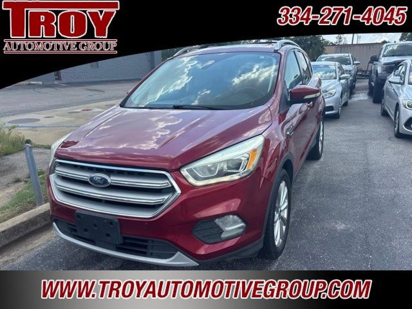 2017 Ruby Red Metallic /Black Ford Escape Titanium (1FMCU9J93HU) with an EcoBoost 2.0L I4 GTDi DOHC Turbocharged VCT engine, Automatic transmission, located at 6812 Atlanta Hwy, Montgomery, AL, 36117, (334) 271-4045, 32.382118, -86.178673 - Priced below KBB Fair Purchase Price!<br><br>Ruby Red Metallic 2017 Ford Escape Titanium 4WD EcoBoost 2.0L I4 GTDi DOHC Turbocharged VCT 6-Speed Automatic<br><br>Financing Available---Top Value for Trades.<br><br>Odometer is 18847 miles below market average! 20/27 City/Highway MPG<br><br><br>Awards:- Photo#4