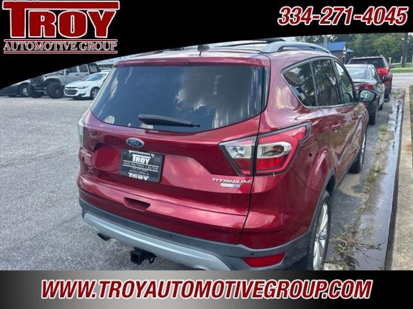 2017 Ruby Red Metallic /Black Ford Escape Titanium (1FMCU9J93HU) with an EcoBoost 2.0L I4 GTDi DOHC Turbocharged VCT engine, Automatic transmission, located at 6812 Atlanta Hwy, Montgomery, AL, 36117, (334) 271-4045, 32.382118, -86.178673 - Priced below KBB Fair Purchase Price!<br><br>Ruby Red Metallic 2017 Ford Escape Titanium 4WD EcoBoost 2.0L I4 GTDi DOHC Turbocharged VCT 6-Speed Automatic<br><br>Financing Available---Top Value for Trades.<br><br>Odometer is 18847 miles below market average! 20/27 City/Highway MPG<br><br><br>Awards:- Photo#8