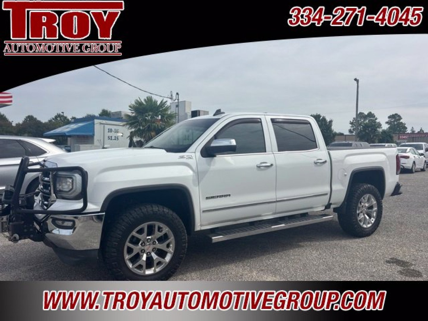 2018 Summit White /Cocoa/Dune GMC Sierra 1500 SLT (3GTU2NEC9JG) with an EcoTec3 5.3L V8 engine, Automatic transmission, located at 6812 Atlanta Hwy, Montgomery, AL, 36117, (334) 271-4045, 32.382118, -86.178673 - Brush guard w/Winch and Light Bar!!<br>Leveled!! 35x12.50x20 Nitto ridge grappler!!<br>Heated /Cooled Seats!!<br>Tow Package!!<br>Summit White 2018 GMC Sierra 1500 SLT 4WD EcoTec3 5.3L V8 6-Speed Automatic Electronic with Overdrive<br><br>Financing Available---Top Value for Trades.- Photo#0