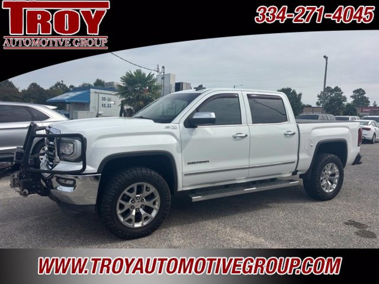 2018 Summit White /Cocoa/Dune GMC Sierra 1500 SLT (3GTU2NEC9JG) with an EcoTec3 5.3L V8 engine, Automatic transmission, located at 6812 Atlanta Hwy, Montgomery, AL, 36117, (334) 271-4045, 32.382118, -86.178673 - Brush guard w/Winch and Light Bar!!<br>Leveled!! 35x12.50x20 Nitto ridge grappler!!<br>Heated /Cooled Seats!!<br>Tow Package!!<br>Summit White 2018 GMC Sierra 1500 SLT 4WD EcoTec3 5.3L V8 6-Speed Automatic Electronic with Overdrive<br><br>Financing Available---Top Value for Trades.- Photo#1